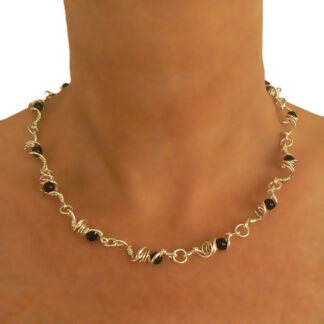 Handgemaakt zilveren collier La noche van flamencosieraden.nl