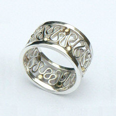Handgemaakte zilveren ring met goud La flor van edelsmid Flamenco