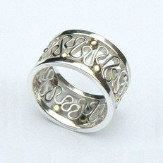 Handgemaakte zilveren ring met goud La flor van edelsmid Flamenco