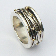 Handgemaakte ring zilver met goud Lluvia de oro van flamencosieraden.nl