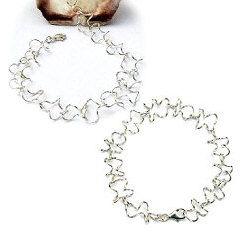 Handgemaakt zilveren collier met armband El meandro ontworpen en uitgevoerd door goudsmidsatelier Flamenco