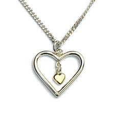 Handgemaakte zilveren hanger hart met een klein gouden hartje