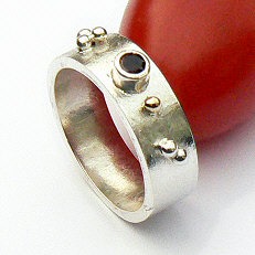 Handgemaakte zilveren ring met goud 7 mm Sueño van flamencosieraden.nl