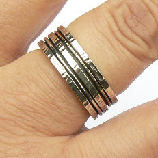 Handgemaakte zilveren ring met 1 massief gouden ringetje by Flamenco