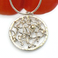 Handgemaakte zilveren hanger met gouden bal Corazon de oro by Flamenco