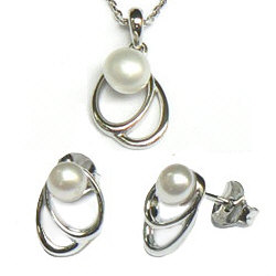 Zilveren set fantasie hanger met oorstekers