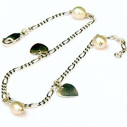 Zilveren enkelbandje met hartjes en parels