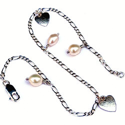 Zilveren enkelbandje met hartjes en parels