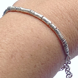 Handgemaakte zilveren armband gesmolten buisjes by Flamenco